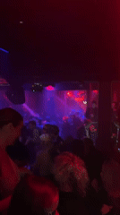 Upscale nightclub hosts live rap performance with VIP dining