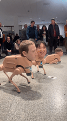 Robotic dogs with human heads exhibited at Berlin museum