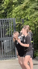 Three women perform synchronized dance routine in Burnaby