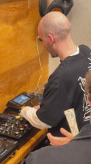 DJ performs at busy New York coffee shop
