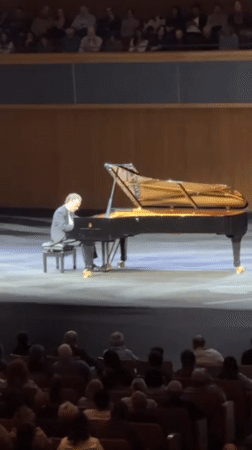 Pianist performs on grand piano for Jerusalem audience