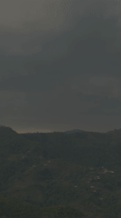 Overcast skies blanket Pokhara mountains in Nepal