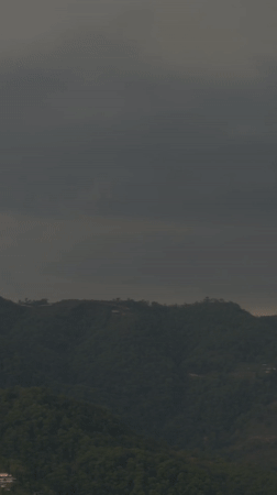 Overcast skies blanket Pokhara mountains in Nepal