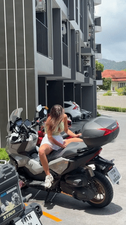Woman on motorcycle observed in Choeng Thale parking area