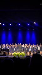 Children's choir performs with pianist in Calella, Spain
