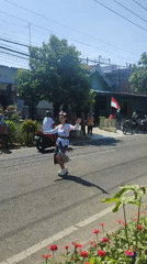 Traditional parade fills the streets of Nganjuk, Indonesia