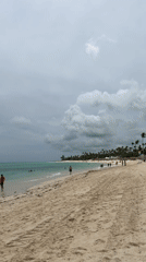 Beach scenes documented under varying weather in Dominican Republic