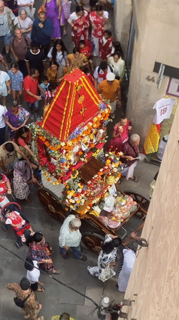 Hindu religious procession moves through Barcelona's old city streets