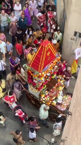 Hindu religious procession moves through Barcelona's old city streets