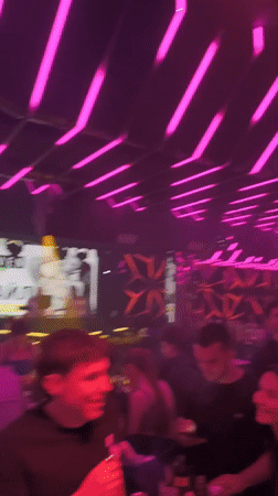 Live night at Club Eleven, Sofia, with neon lights and performers