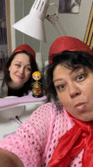 Women don red accessories for morning event in Chaikovsky