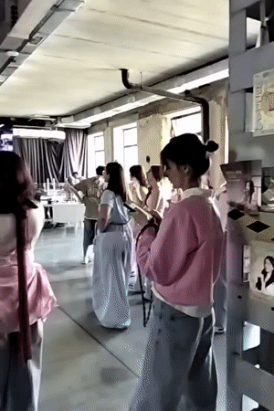 Dance group rehearses choreographed routines in Ivano-Frankivsk studio