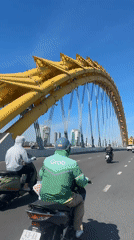 Morning street life and Dragon Bridge in central Đà Nẵng