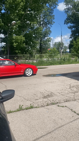 Drift cars throwing smoke at a Tolyatti track session