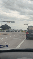 Driver records busy Arlington intersection with Sysco truck present