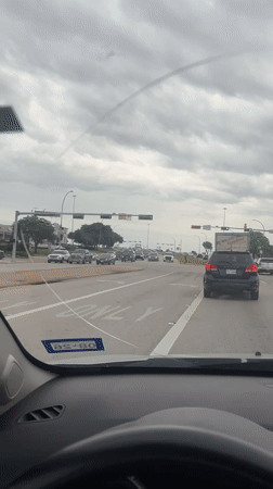 Driver records busy Arlington intersection with Sysco truck present