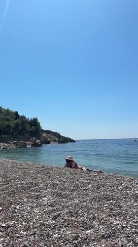 Sunday morning beach activities captured at Kamenovo, Montenegro