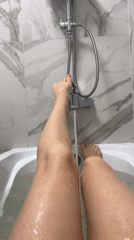 Person Takes Bath in Sinyavino Bathtub