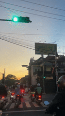 Evening street life documented in North Kuta during sunset