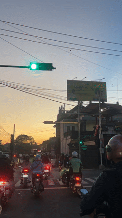 Evening street life documented in North Kuta during sunset