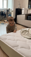 Moscow parent documents baby's playtime with cat and bubbles