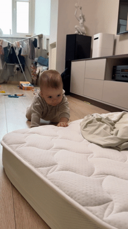 Moscow parent documents baby's playtime with cat and bubbles