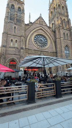 Evening patio life captured in Montreal's gothic district