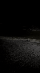 Nighttime waves crash on Sochi beach, captured by witnesses