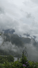 Fog shrouds green mountain ranges in northern Vietnam