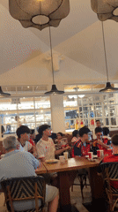 Football fans pack a València restaurant for a big match
