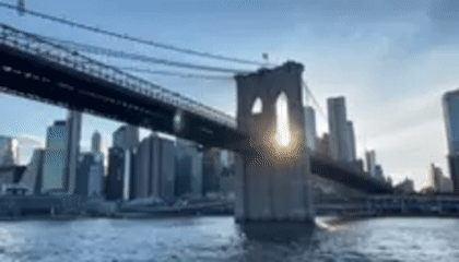 Brooklyn Bridge views from the water at night
