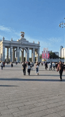 Live music and stuffed animals fill a Moscow plaza on a sunny afternoon