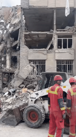 Building collapse documented in Tehran with extensive structural damage
