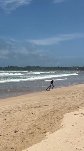 Morning Beach Activities Captured in Peleana, Sri Lanka