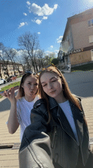 Sunny Spring Day Brings Residents Outdoors in Chaikovsky
