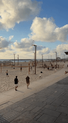 Tel Aviv beachfront buzzing on a sunny June afternoon