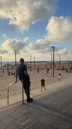 Tel Aviv beachfront buzzing on a sunny June afternoon