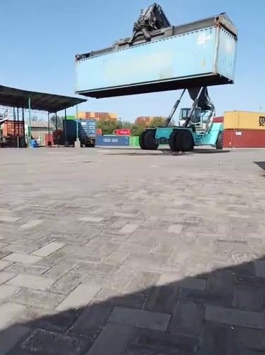 Port operations and everyday scenes around Surabaya's industrial edge