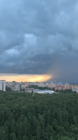 Storm views across Perm with cat break indoors