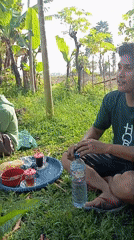 Rural outdoor gathering documented in Baron, Indonesia countryside