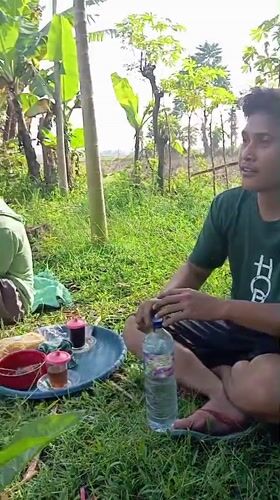 Rural outdoor gathering documented in Baron, Indonesia countryside
