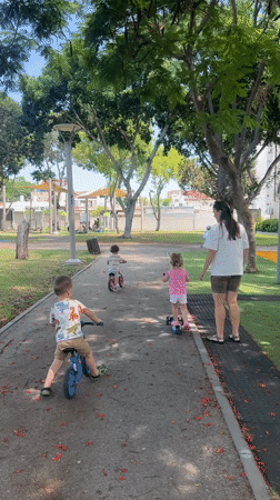 Balance bike fun on a sunny morning at a Kiryat Bialik park