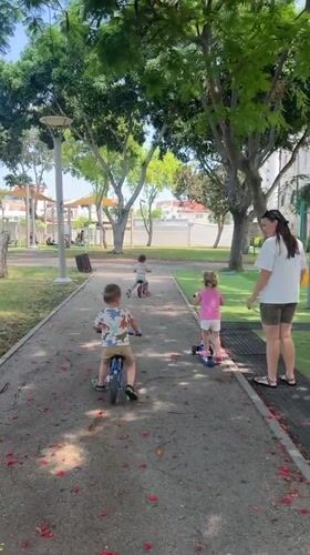 Balance bike fun on a sunny morning at a Kiryat Bialik park