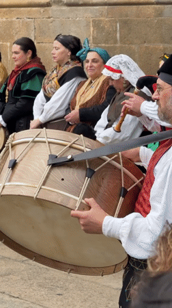 Traditional folk dancers perform in Santiago de Compostela plaza