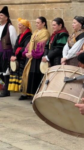 Traditional folk dancers perform in Santiago de Compostela plaza