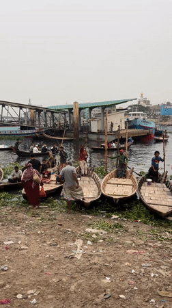 Daily commerce and labor activity along Dhaka waterfront