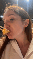 Woman enjoys sushi breakfast at Wichit restaurant