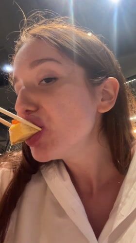 Woman enjoys sushi breakfast at Wichit restaurant
