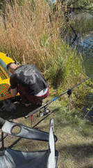 Angler prepares inflatable raft for fishing trip in Mittenwalde