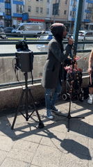 Street musicians perform in Berlin amid local retail activity